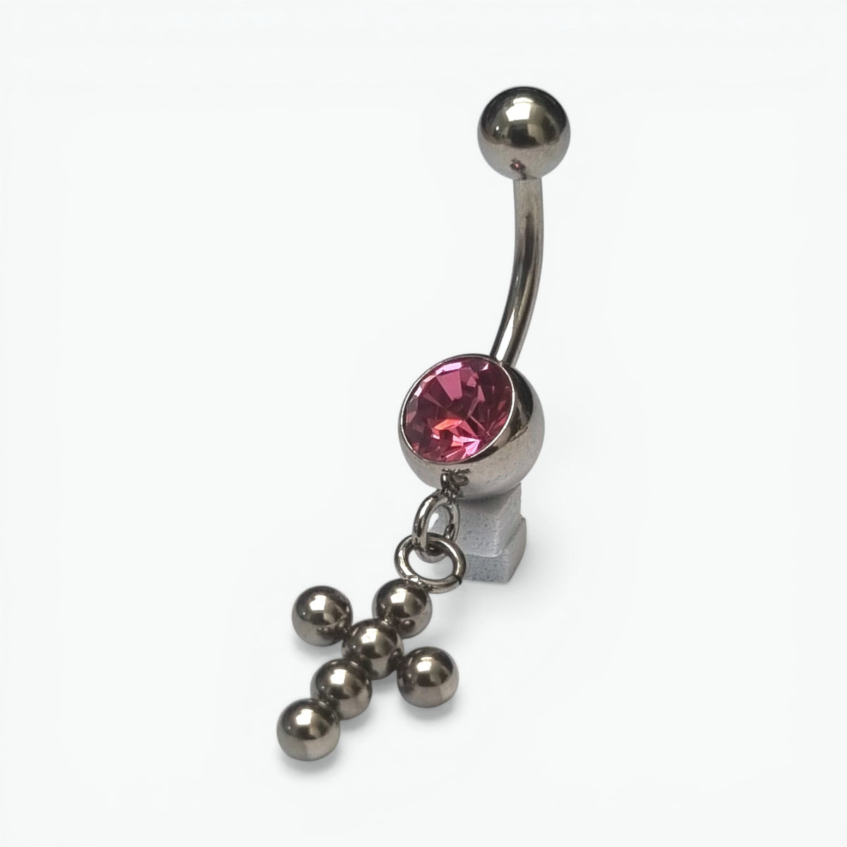 Piercing nombril en acier et zircon rose avec croix
