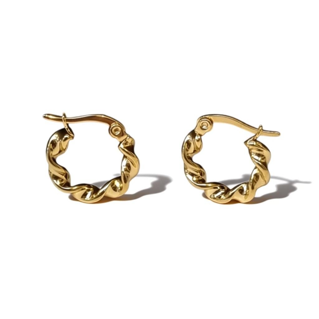 Stalen Creolen gedraaid Goudkleur - Aramat Jewels - Oorringen - cadeautip