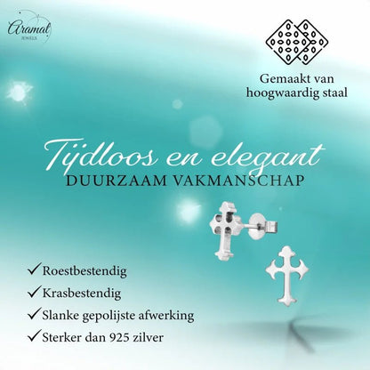 Zilveren oorbellen met kruis.