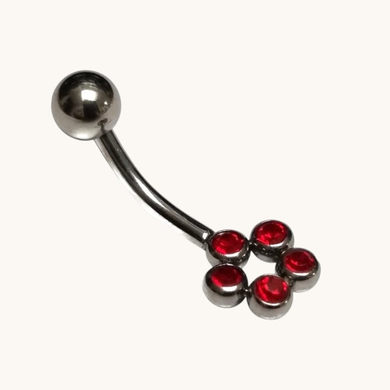Piercing nombril en acier avec points de zircon rouge