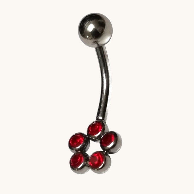 Piercing nombril en acier avec points de zircon rouge