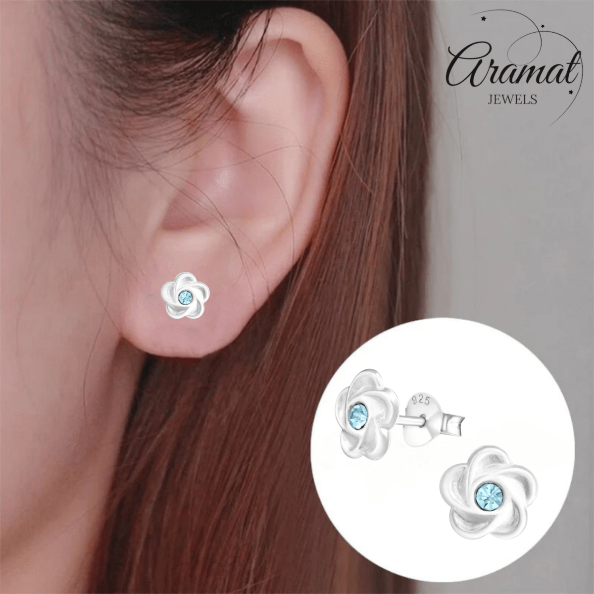 Zilveren bloemen oorstekers met blauwe kristal - Aramat Jewels - Oorbellen - cadeautip